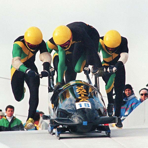 jamaican bobsleigh team pushing off at start of run